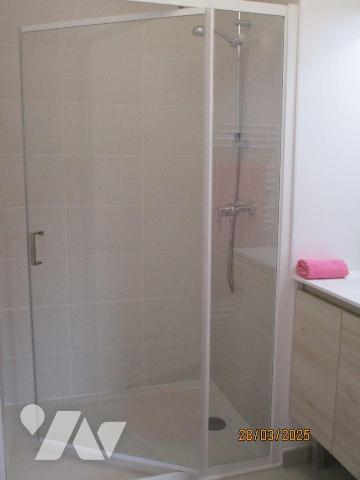 Dans immeuble neuf, au rez-de-chaussée :  APPARTEMENT comprenant entrée-couloir, buanderie-chau...