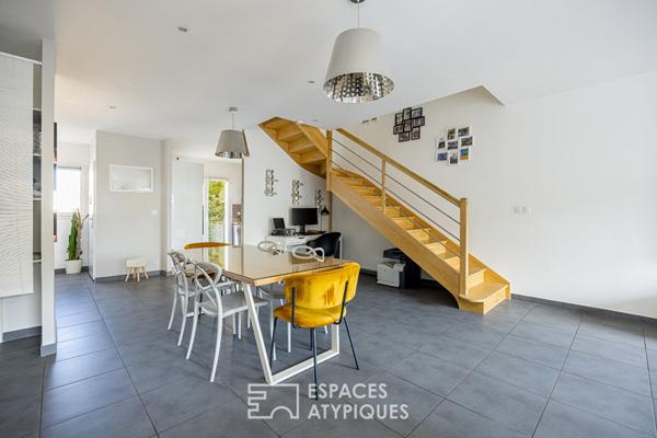 Maison en duplex avec terrasse et garage