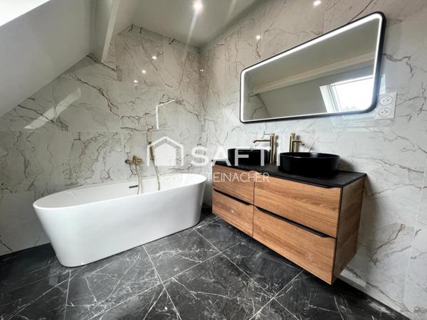 Maison 4 chambres rénovée - sous-sol - garage