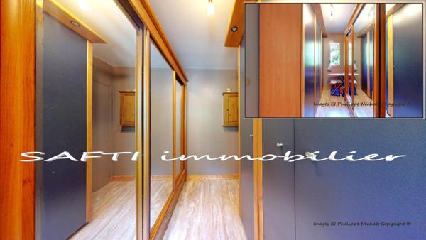 Maison individuelle non mitoyenne de 115m2 habitables - 3/4 chambres - sous-sol total sur 1446m2 de terrain entièrement arboré et paysagé .