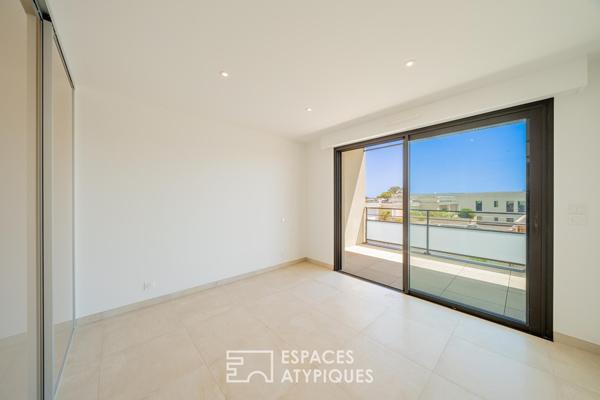 Duplex dernier étage avec rooftop et aperçu mer