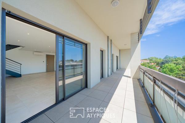 Duplex dernier étage avec rooftop et aperçu mer