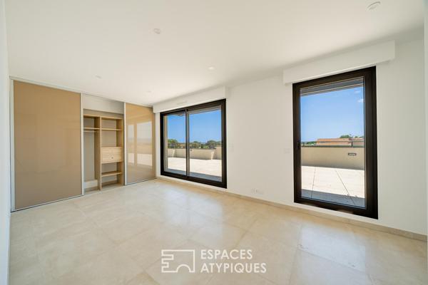 Duplex dernier étage avec rooftop et aperçu mer