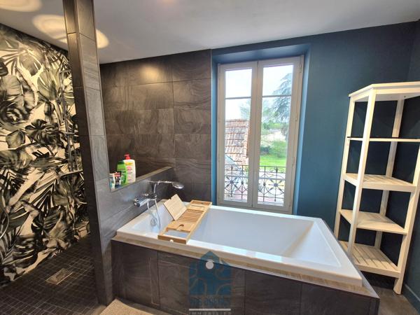 Maison 9 pièce(s) 5 chambre(s) 240 m²