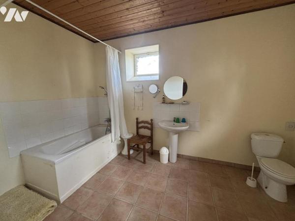 SECTEUR SAINT JEAN LE BLANC / PROPRIÉTÉ EN PIERRE AVEC TERRAIN D'ENVIRON 1.5HA