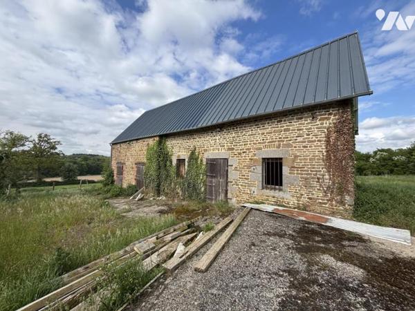 SECTEUR SAINT JEAN LE BLANC / PROPRIÉTÉ EN PIERRE AVEC TERRAIN D'ENVIRON 1.5HA
