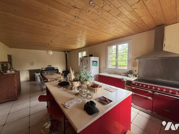 SECTEUR SAINT JEAN LE BLANC / PROPRIÉTÉ EN PIERRE AVEC TERRAIN D'ENVIRON 1.5HA