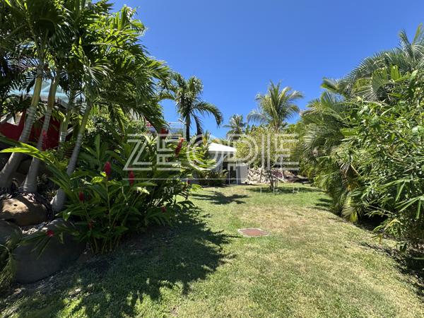 Saint-François (97118) Villa d'architecte idéale golfeurs avec 3 chambres + bureau, piscine et terrain de 1750m².