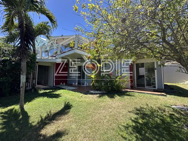 Saint-François (97118) Villa d'architecte idéale golfeurs avec 3 chambres + bureau, piscine et terrain de 1750m².