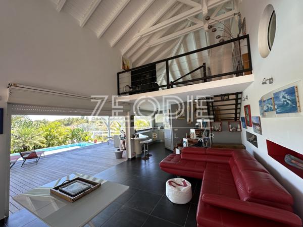 Saint-François (97118) Villa d'architecte idéale golfeurs avec 3 chambres + bureau, piscine et terrain de 1750m².