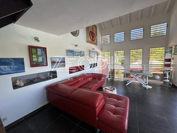 Saint-François (97118) Villa d'architecte idéale golfeurs avec 3 chambres + bureau, piscine et terrain de 1750m².