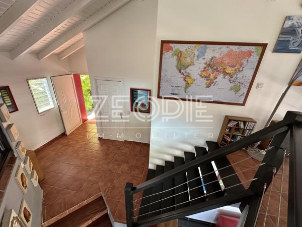 Saint-François (97118) Villa d'architecte idéale golfeurs avec 3 chambres + bureau, piscine et terrain de 1750m².