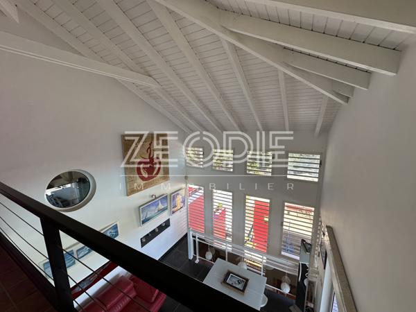 Saint-François (97118) Villa d'architecte idéale golfeurs avec 3 chambres + bureau, piscine et terrain de 1750m².