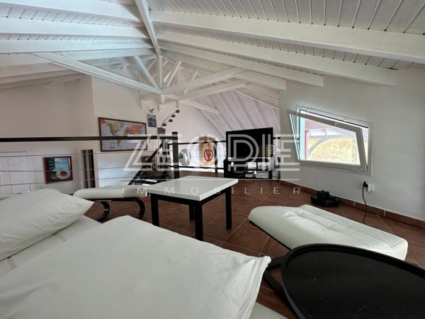 Saint-François (97118) Villa d'architecte idéale golfeurs avec 3 chambres + bureau, piscine et terrain de 1750m².