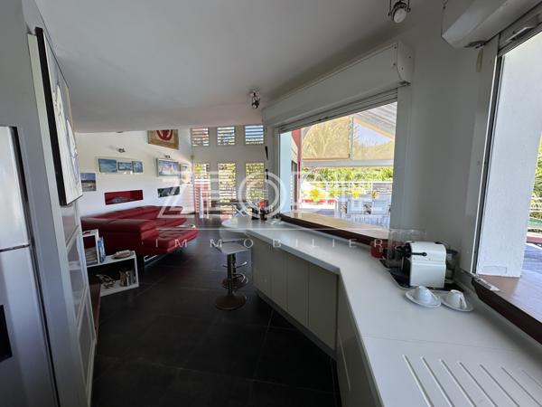 Saint-François (97118) Villa d'architecte idéale golfeurs avec 3 chambres + bureau, piscine et terrain de 1750m².