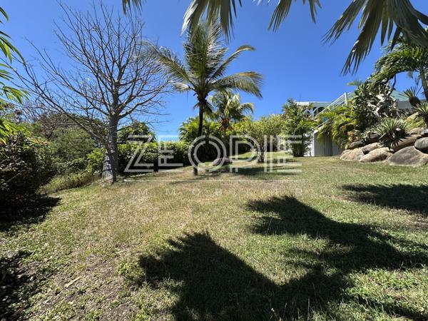 Saint-François (97118) Villa d'architecte idéale golfeurs avec 3 chambres + bureau, piscine et terrain de 1750m².