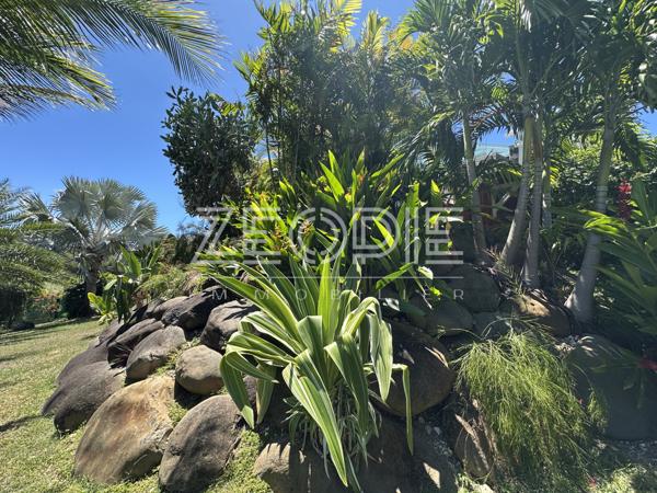 Saint-François (97118) Villa d'architecte idéale golfeurs avec 3 chambres + bureau, piscine et terrain de 1750m².