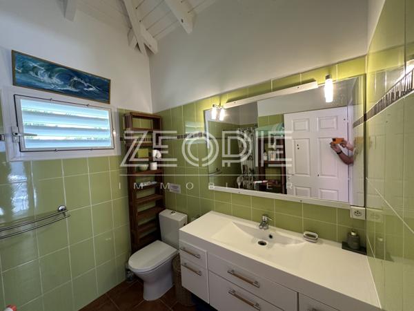 Saint-François (97118) Villa d'architecte idéale golfeurs avec 3 chambres + bureau, piscine et terrain de 1750m².