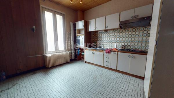 Appartement à rénover de 92 m2 dans le coeur de ST SEURIN
