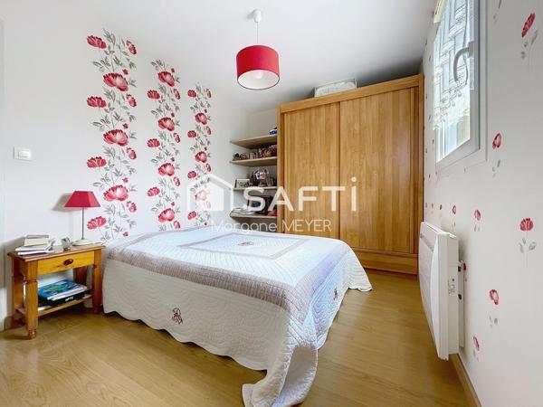 Maison de plain-pied quatre chambres avec jardin