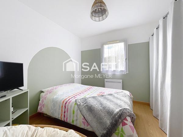 Maison de plain-pied quatre chambres avec jardin