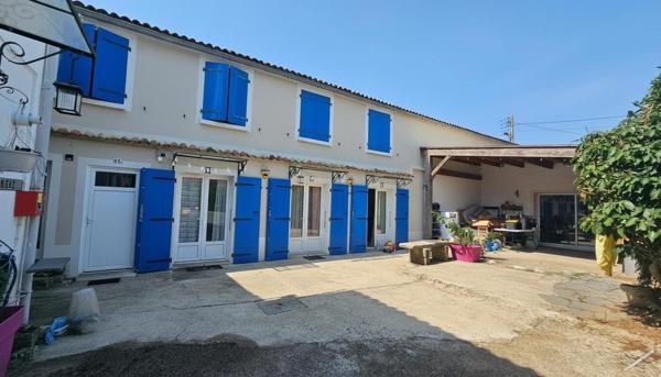 ensemble immobilier de plus de 400m² avec parking
