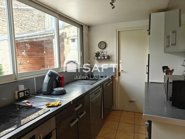 Maison centre ville avec 5 chambres, cours et garage