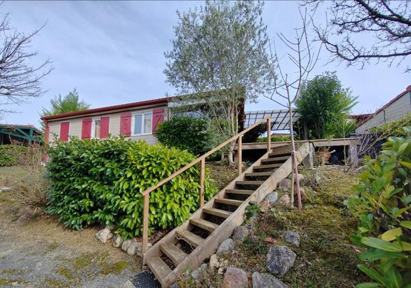 Chalet de 35 m2 + terrain dans un parc de loisir résidentiel à 8 minutes de AUCH, vendu meublé.