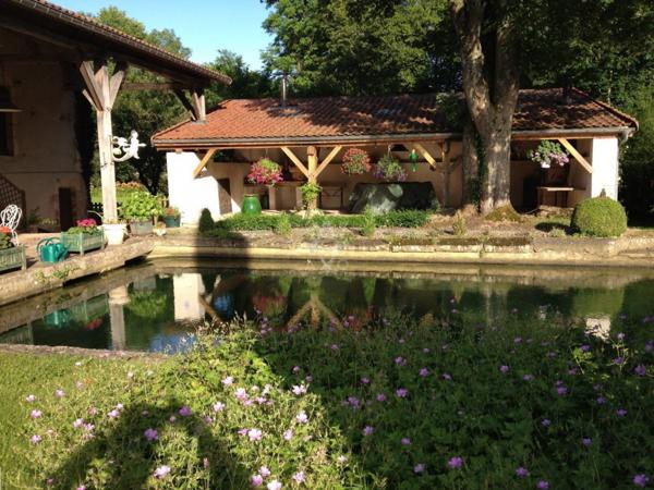 Le Moulin de la Roche propriété de Charme sur 1,5 hectares au coeur de la Haute-Marne