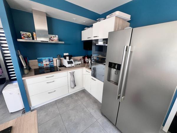 Maison 108 m²-4 chambres-497 m² de jardin