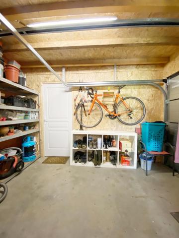 MAISON NEUVE AVEC GARAGES ET JARDIN