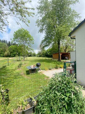 MAISON NEUVE AVEC GARAGES ET JARDIN