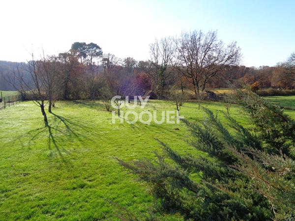 Maison de plain-pied avec 3 chambres, garage et jardin