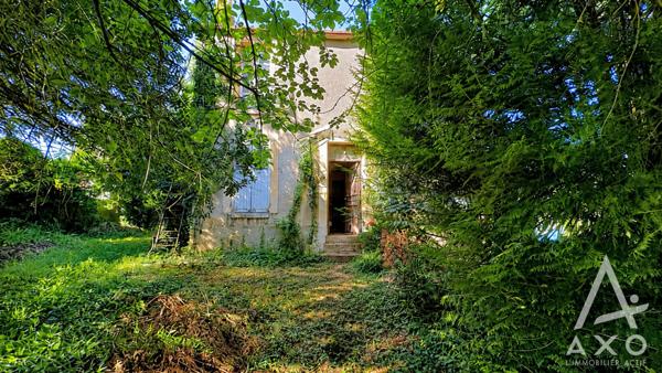 Maison familiale avec garage et dépendance