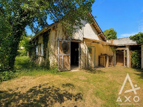 Maison familiale avec garage et dépendance