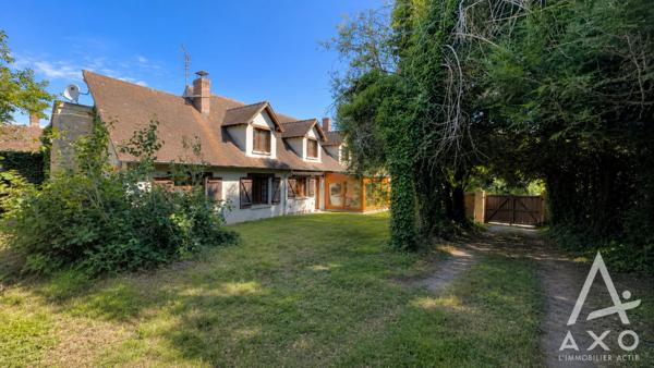 Maison familiale avec garage et dépendance
