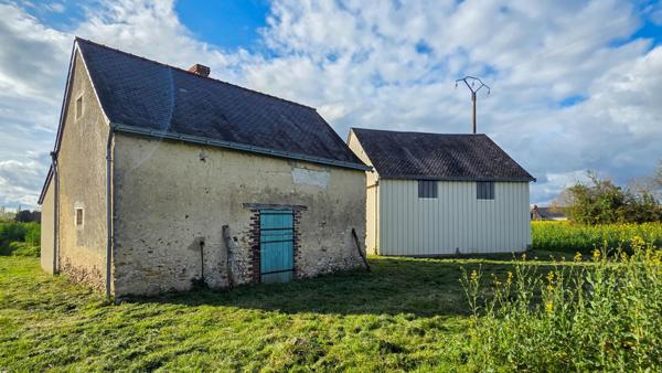 Maison à restaurer avec hangar
