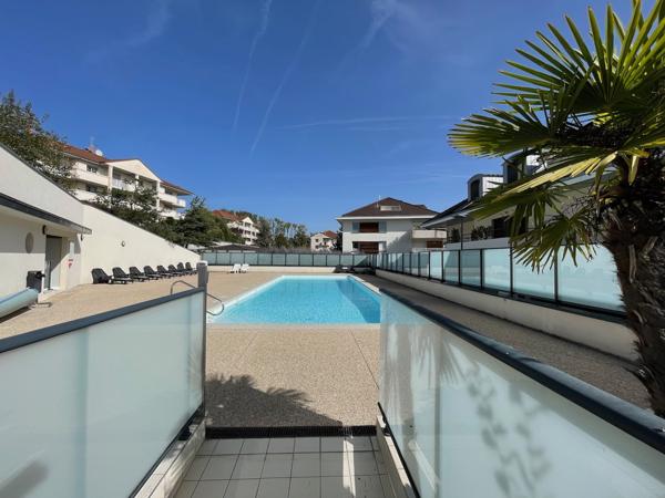 Divonne-les-Bains (01220) Appartement trois chambres avec jardin et piscine