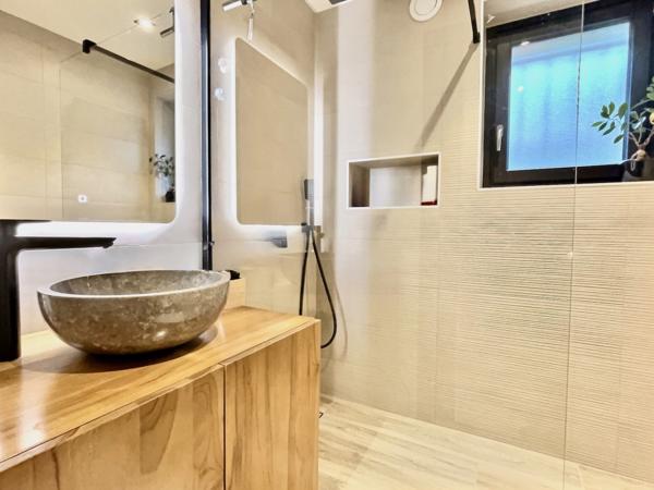 Divonne-les-Bains (01220) Appartement trois chambres avec jardin et piscine