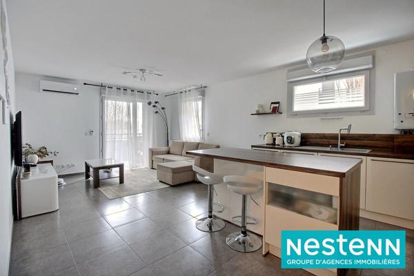 Appartement Meyzieu 4 pièce(s) 77 m2 avec balcon, cave et place de parking sécurisée