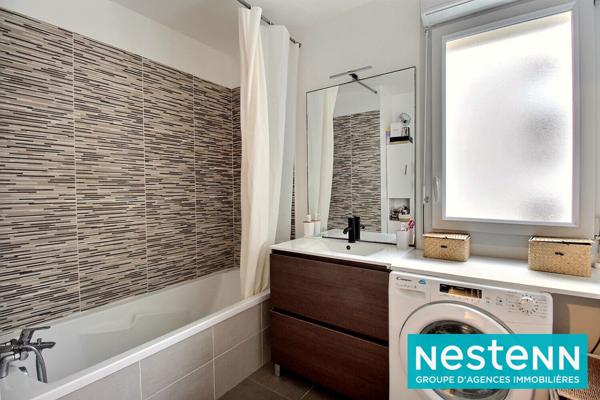 Appartement Meyzieu 4 pièce(s) 77 m2 avec balcon, cave et place de parking sécurisée