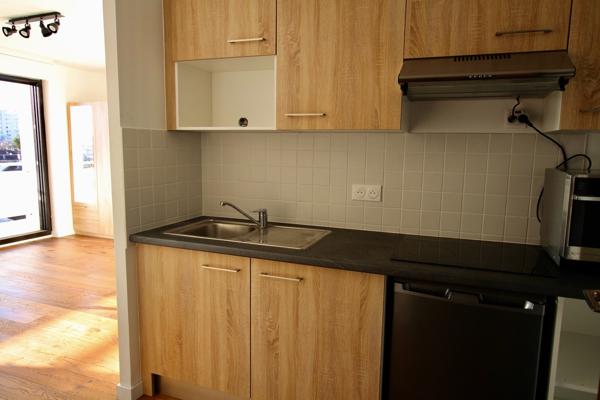 Appartement  T1 avec terrasse loué Meublé avec cave et parking