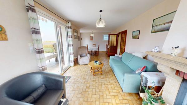 Maison sur sous-sol complet dans un environnement calme avec un parc clos et arboré !