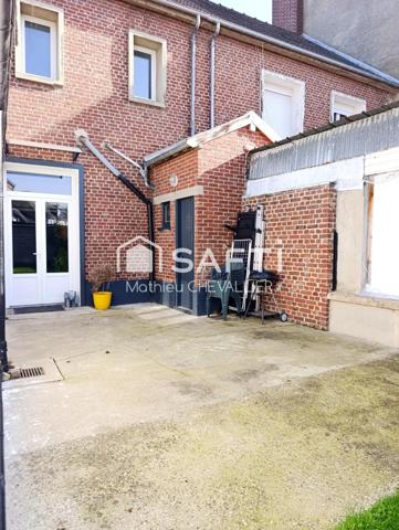 Maison rénovée avec jardin à 5 min du centre.