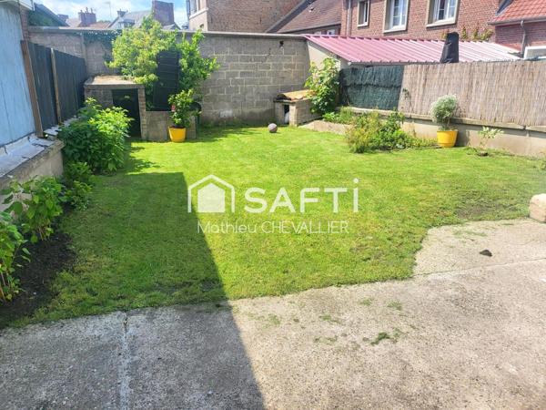 Maison rénovée avec jardin à 5 min du centre.