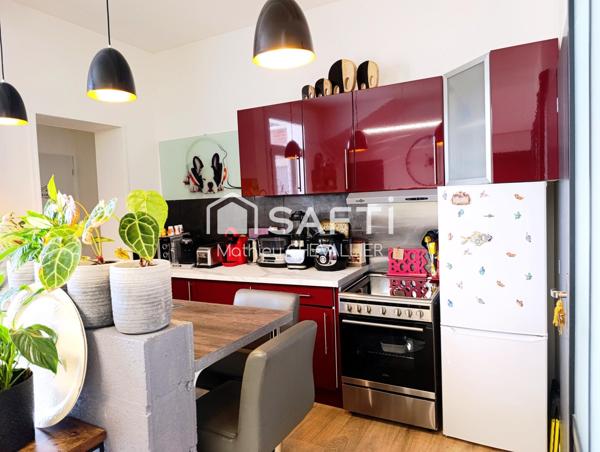 Maison rénovée avec jardin à 5 min du centre.