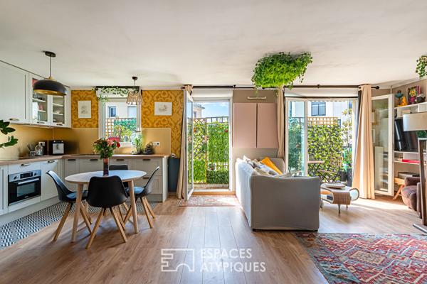 Appartement traversant avec balcon en dernier étage