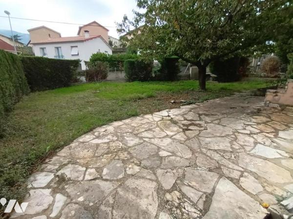 Appartement  avec garage et jardin