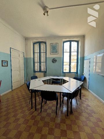 Immeuble d'environ 780 m² répartis sur quatre niveaux incluant deux terrasses