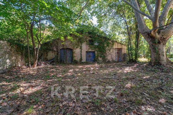Propriété sur un terrain constructible de 3.500m² en coeur de ville